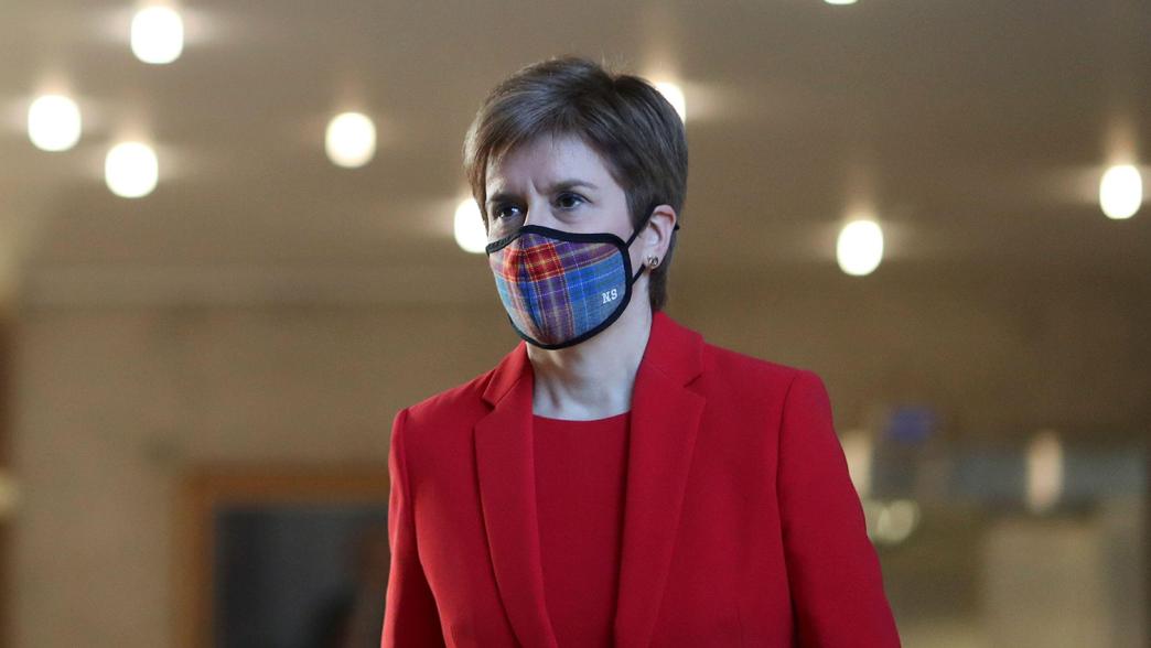 First minister Nicola Sturgeon, wearing a face mask, arrives to update the Scottish Parliament on Covid restrictions