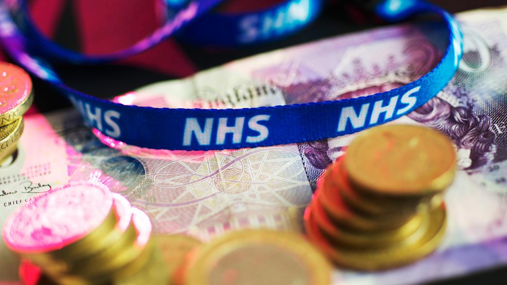 NHS lanyard and close up of money