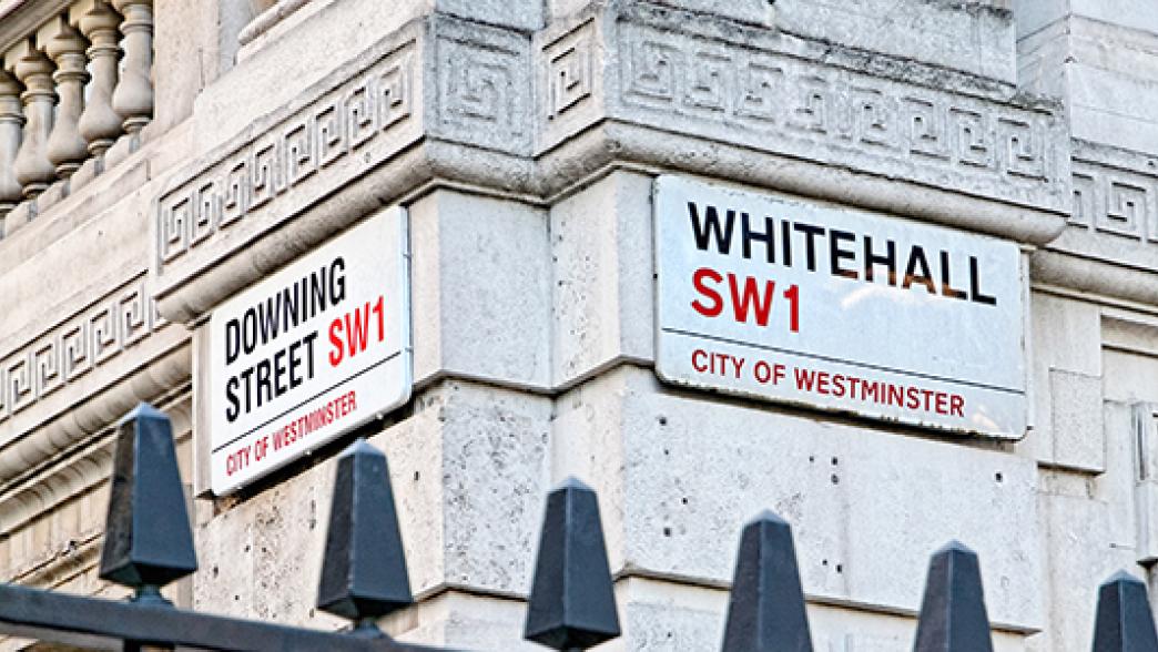 Street signs showing Downing Street and Whitehall