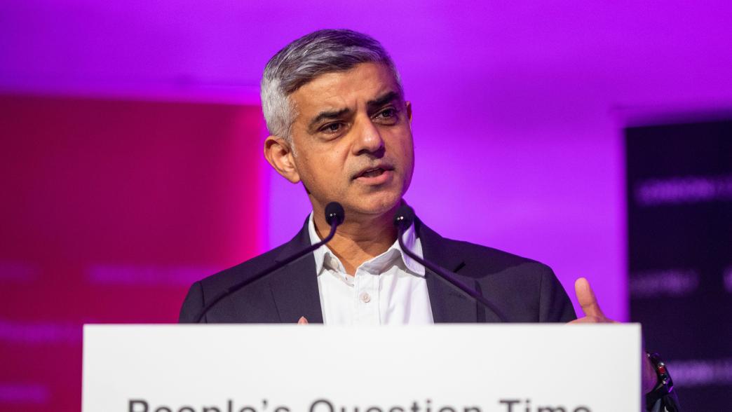 Sadiq Khan speaking at a podium which reads 'People's Question Time'