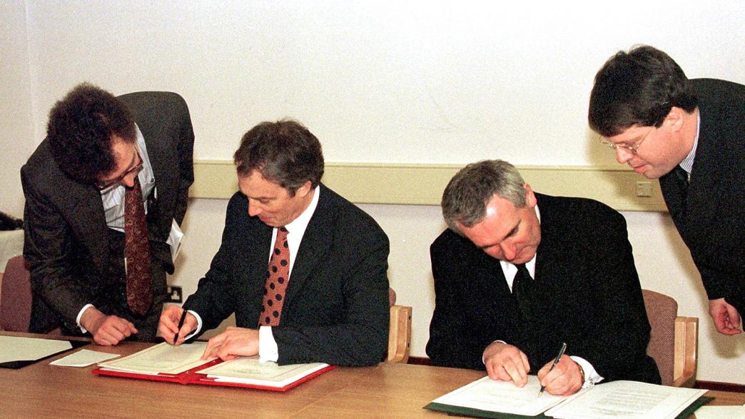 Prime minister Tony Blair (left) and then Taoiseach Bertie Ahern signing the Good Friday peace agreement, which stated that the people of Northern Ireland will decide democratically their own future.