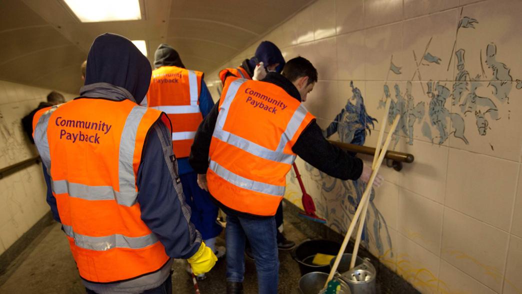 Offenders take part in a community payback scheme