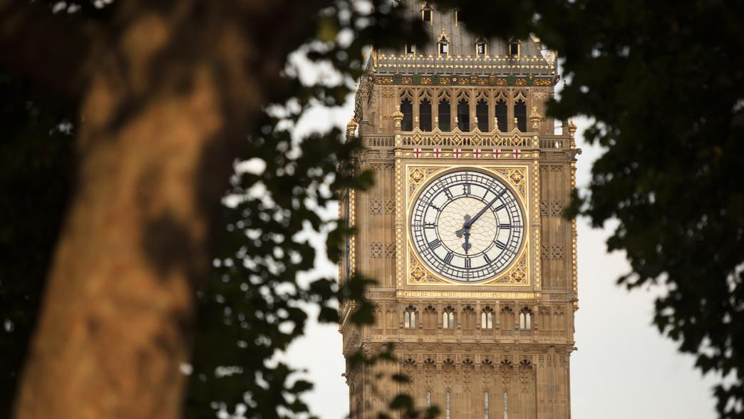 Big Ben, parliament, appearing through the trees