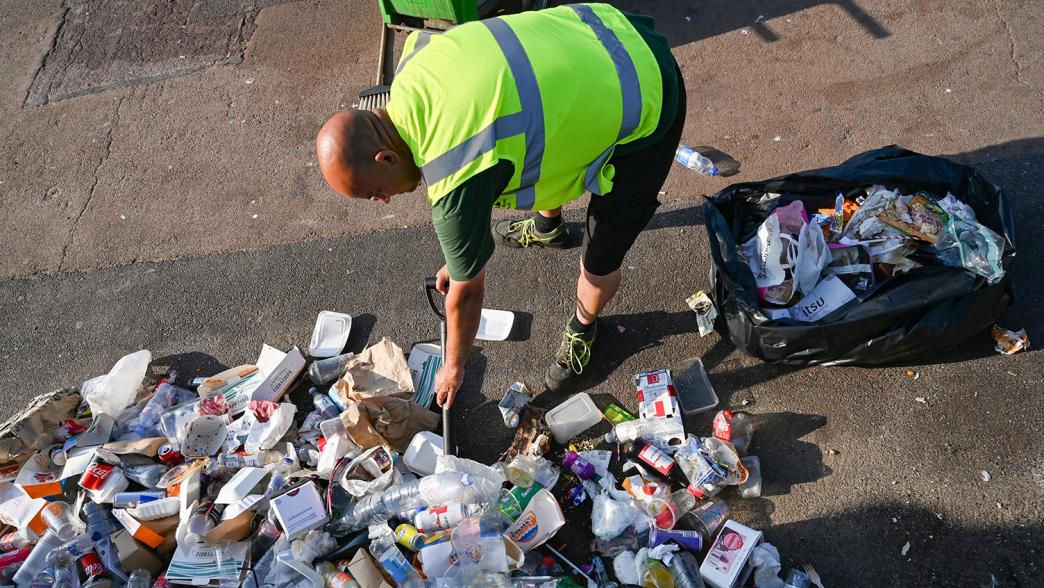 Council staff clean up rubbish left behind on Brighton beach