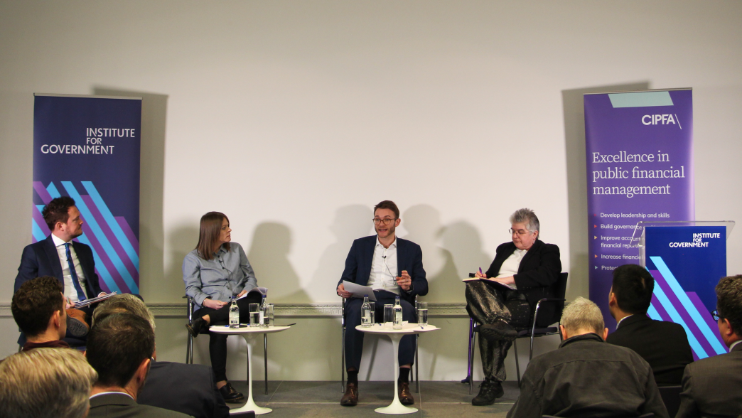 An image of the event's panel in discussion