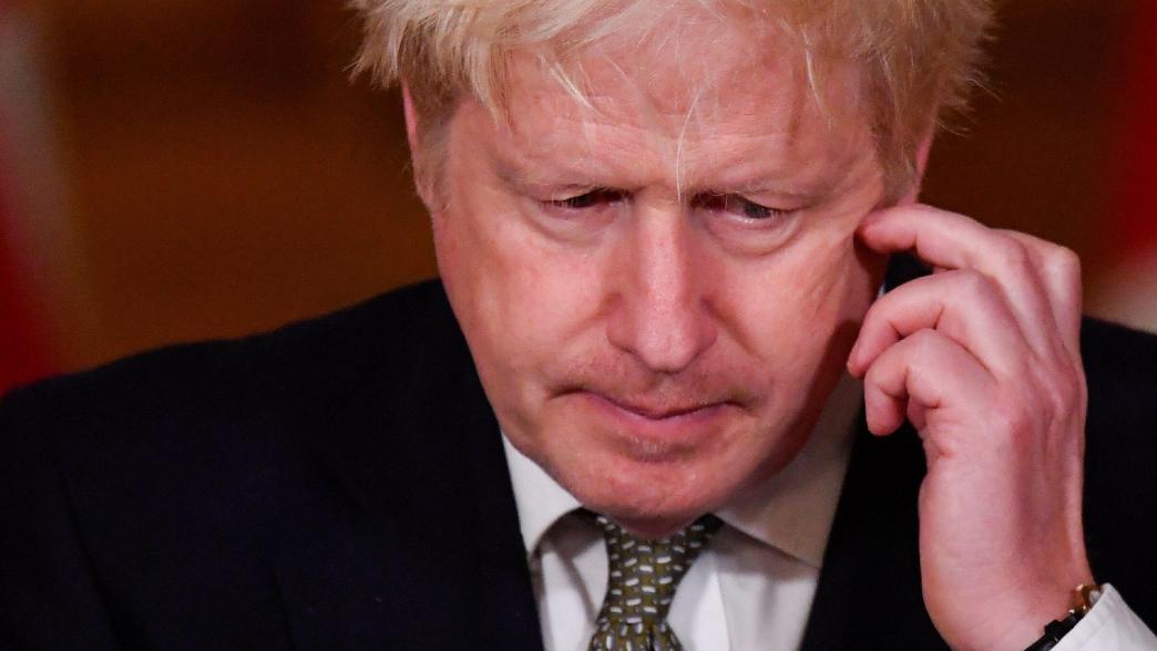 Boris Johnson looking concerned at a Downing Street press conference.