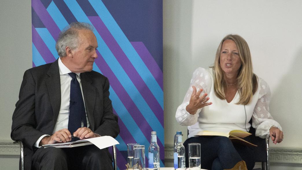 Gareth Rhys Williams, Government Chief Commercial Officer, and Sally Guyer, Global CEO of World Commerce and Contracting, on stage at the IfG.