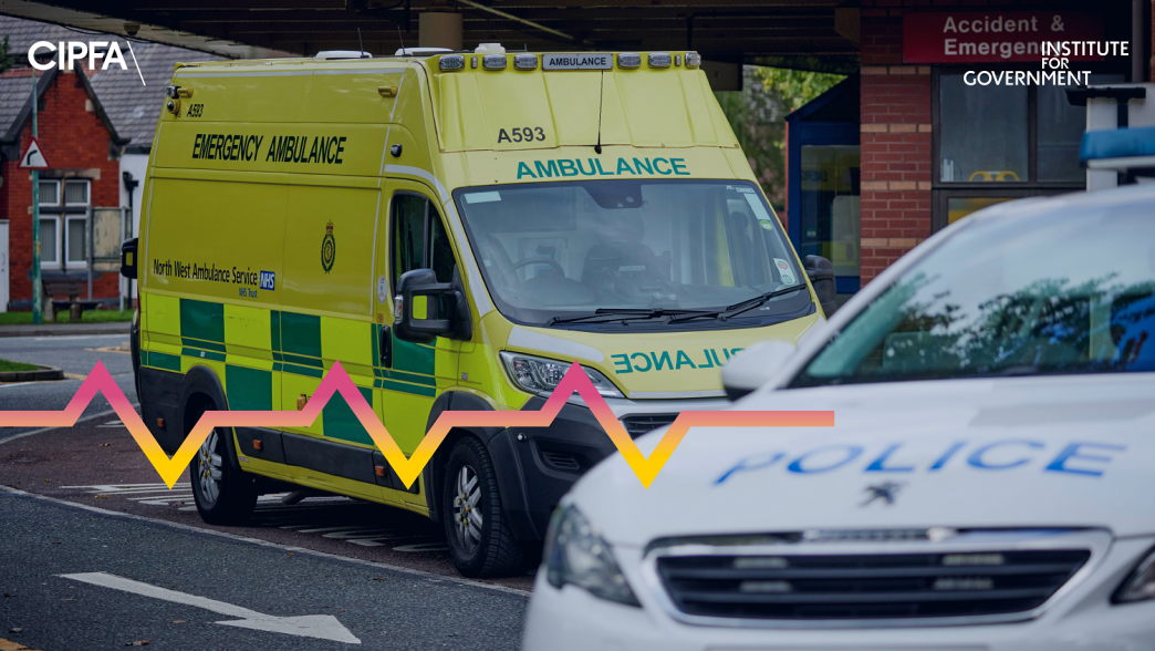 Ambulance and police car at A&E North Manchester General Hospital
