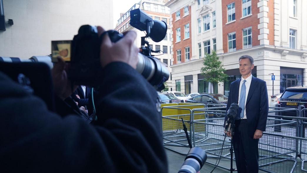 Chancellor Jeremy Hunt outside the BBC studios talking to the press ahead of his 2023 autumn statement.