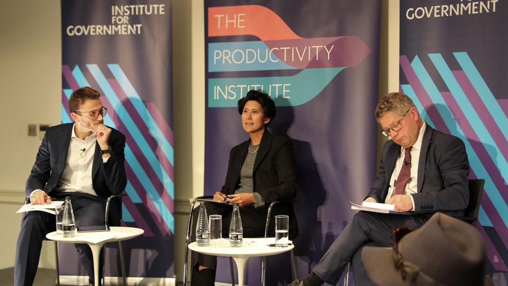 Nick Davies, Cat Little, and Professor Bart van Ark in discussion on stage at the Institute for Government.