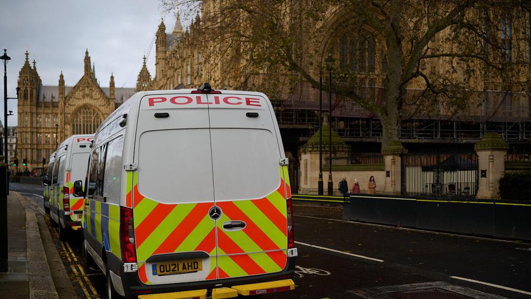 Police vans outside the Houses of Parliament.