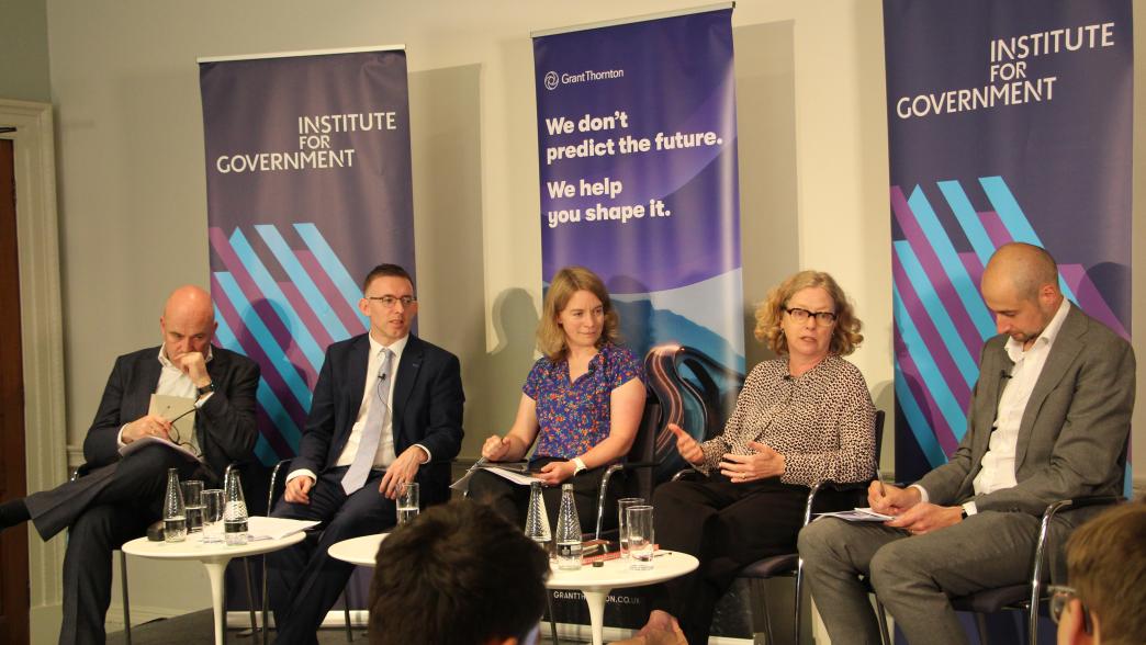 Panellists on stage at the Institute for Government