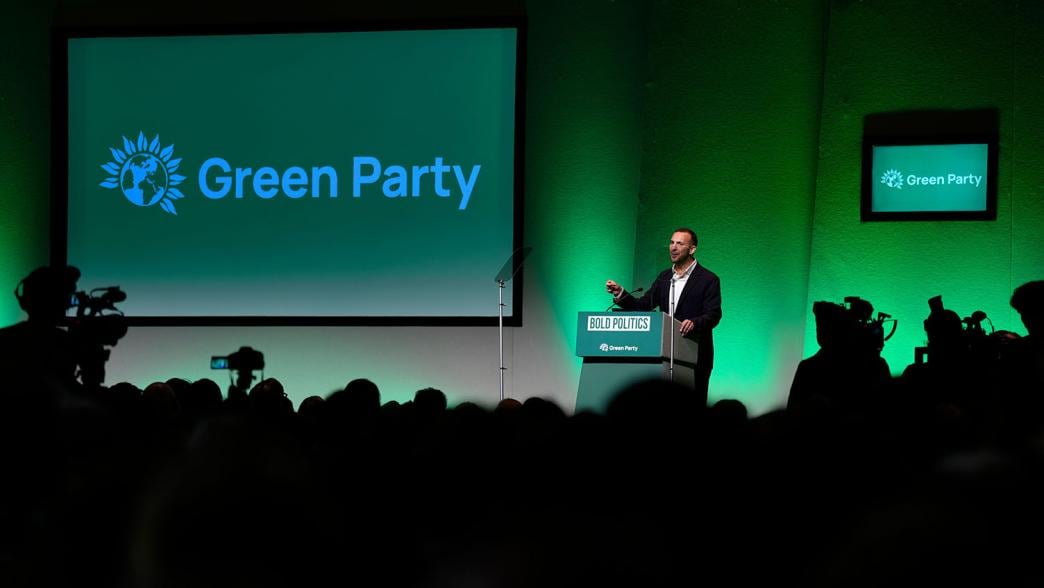 Zack Polanski, leader of the Green Party, on stage at the party's autumn conference.