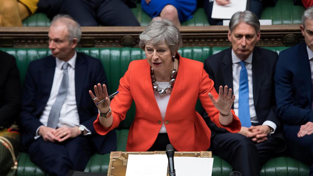 British Prime Minister Theresa May (C) is seen during the Brexit deal vote in the House of Commons in London, Britain, on March 12, 2019. British Prime Minister Theresa May's Brexit deal was rejected again on Tuesday by MPs in the second meaningful vote in the parliament since January, increasing uncertainty about how the country will leave the European Union. 