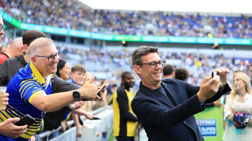 andy burnham taking a selife