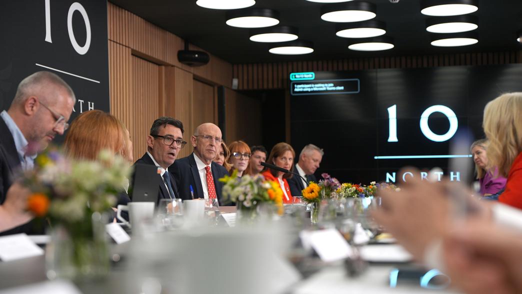 Prime Minister Andy Burnham (rear centre) sits between Cabinet Secretary Antonia Romeo (left) and Chancellor of the Exchequer John Healey (right) during a National Economic Council meeting at No 10 North