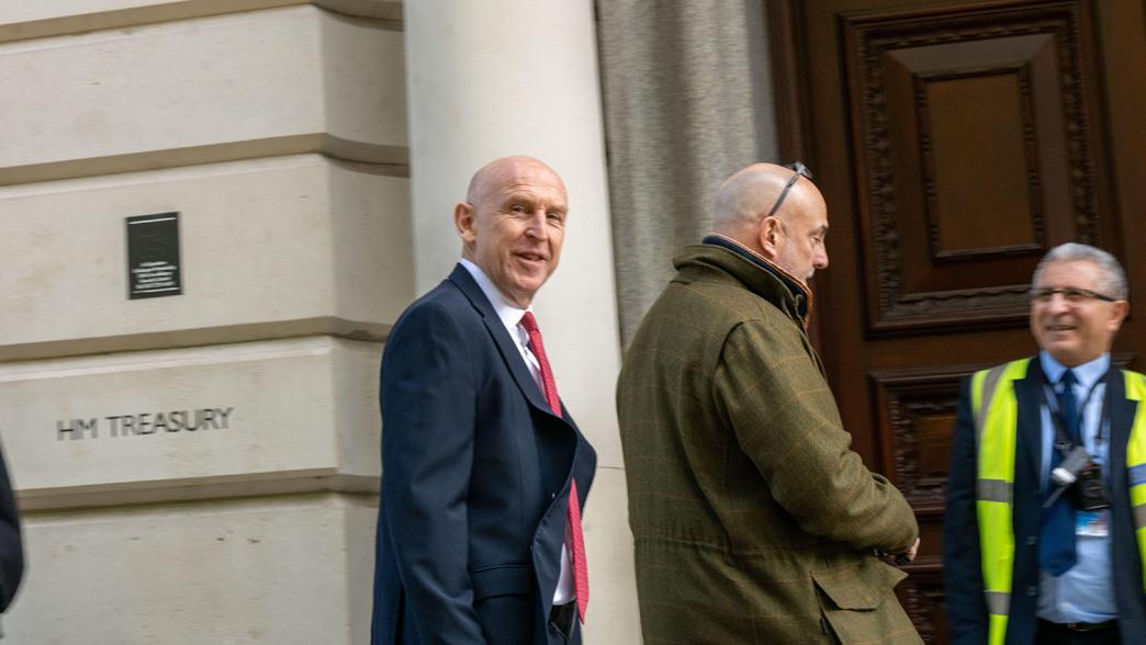  John Healey, Chancellor of the Exchequer, walks to the Treasury from 11 Downing Street