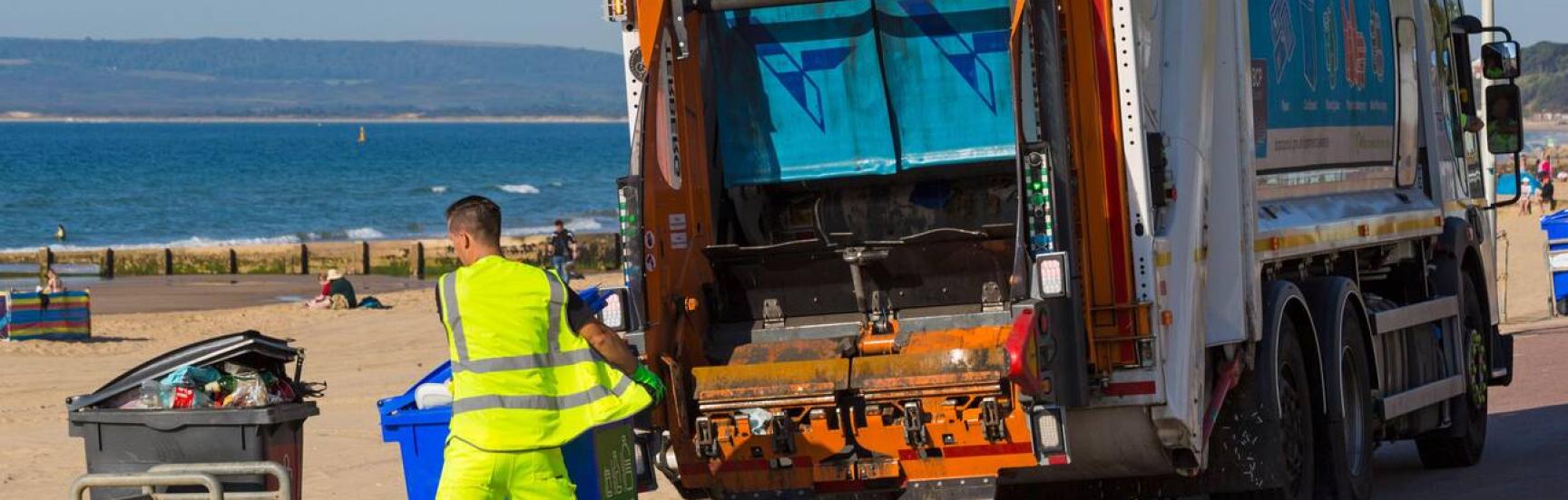 Refuse worker collects rubbish along Bournemouth seafront