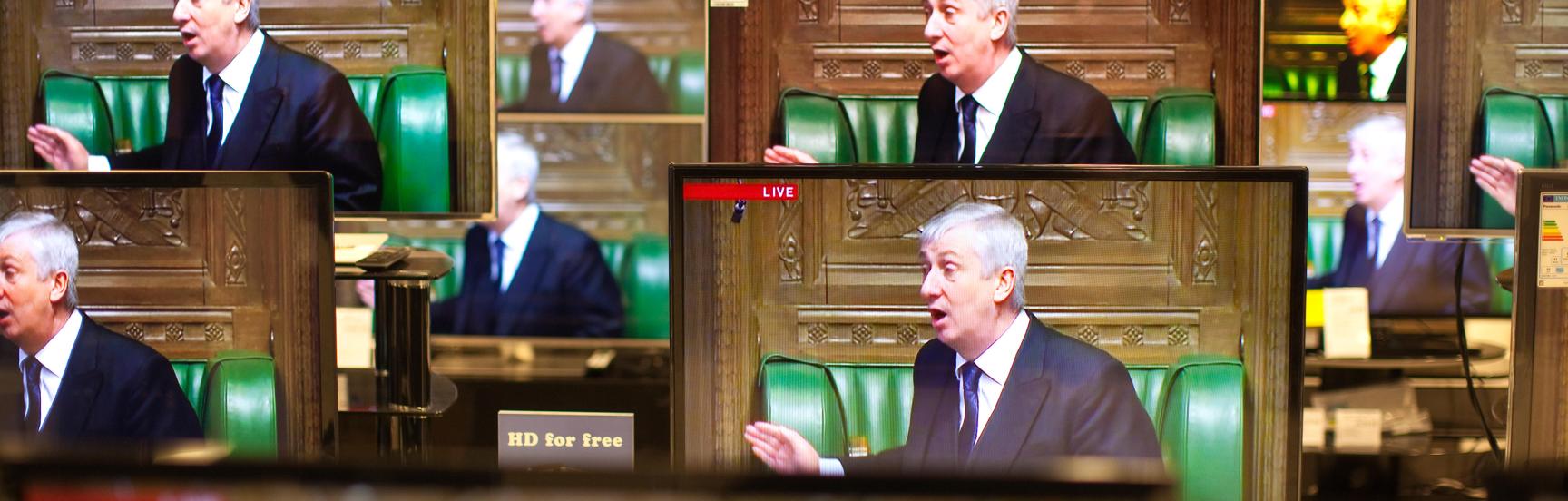 TV screens with Sir Lindsay Hoyle, Speaker of the House of Commons