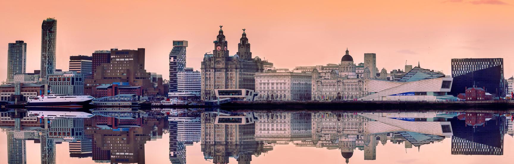 The Liverpool city skyline at dawn.