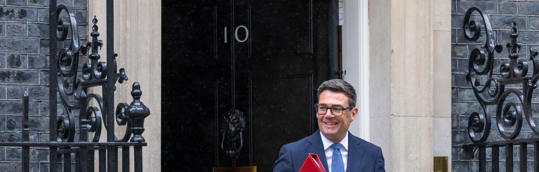 Andy Burnham leaves 10 Downing Street to attend his first PMQs since becoming PM. 