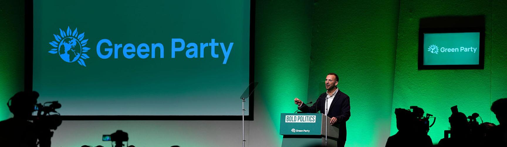 Zack Polanski, leader of the Green Party, on stage at the party's autumn conference.