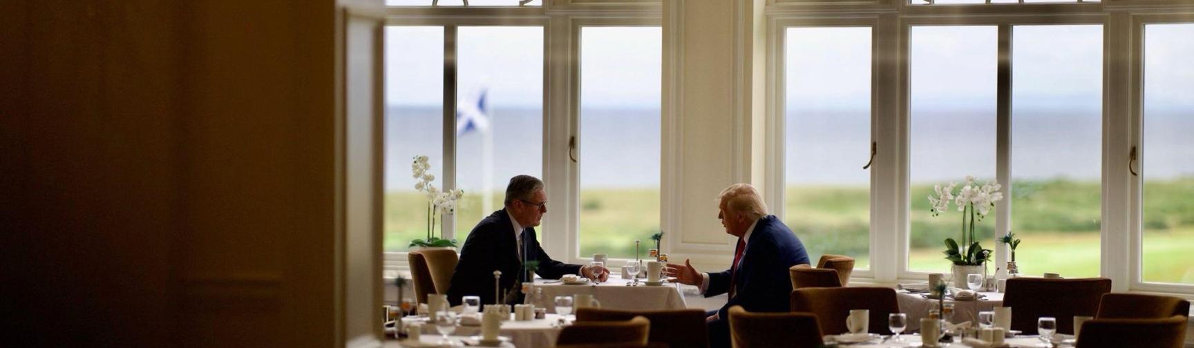Keir Starmer and Donald Trump at a table. 