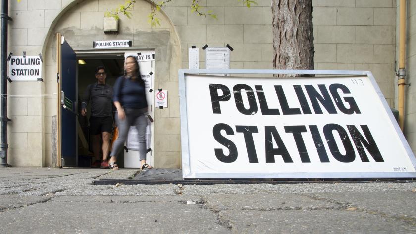 People walking out of a polling station
