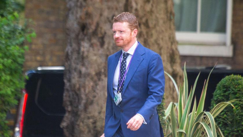 Morgan McSweeney, the PM's Chief of Staff, walking down Downing Street. He is wearing a blue suit.
