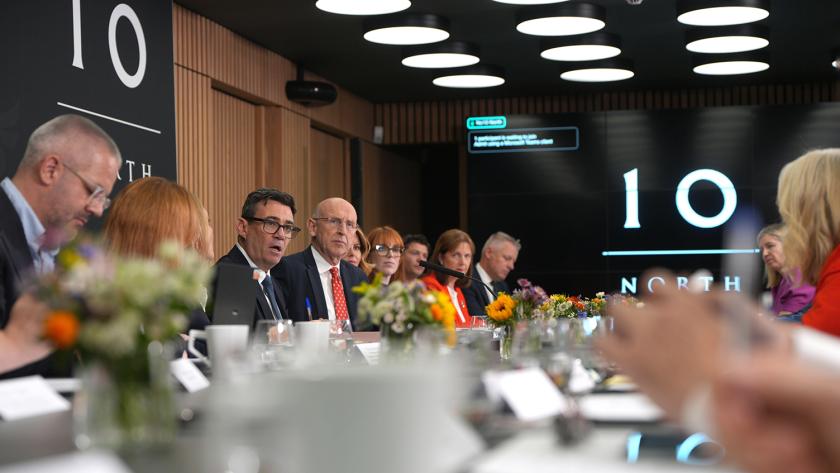 Prime Minister Andy Burnham (rear centre) sits between Cabinet Secretary Antonia Romeo (left) and Chancellor of the Exchequer John Healey (right) during a National Economic Council meeting at No 10 North