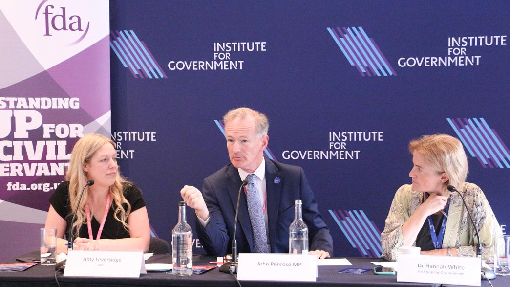 An image of Amy Leversidge, John Penrose MP and Dr Hannah White at the Conservative Party Conference during a panel discussion.
