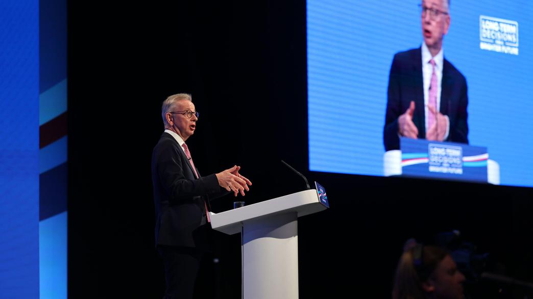 Michael Gove on stage at the 2023 Conservative Party Conference in Manchester.