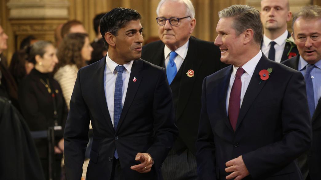 Rishi Sunak, left, Keir Starmer arrive for the State Opening of Parliament. 