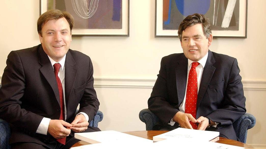 The chancellor of the exchequer Gordon Brown (right) sat with Ed Balls the chief economic adviser, with the euro report laid on the table.
