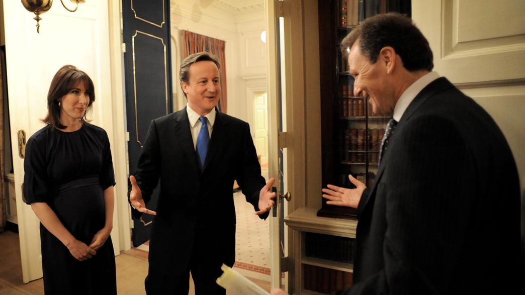 Then cabinet secretary Gus O'Donnell welcomes David Cameron and his wife Samantha to Downing Street after the Conservative Party wins the 2010 general election.