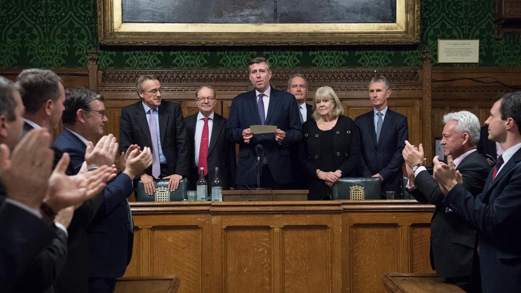 Sir Graham Brady (centre), chairman of the 1922 Committee, announces that Theresa May has survived an attempt by Tory MPs to oust her as party leader with a motion of no confidence at the Houses of Parliament in London.