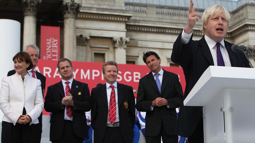 Mayor of London Boris Johnson (r) delivers a speech on the stage in Trafalgar Square during the Team GB homecoming Parade in Central London as Lord Sebastian Coe, Colin Moynihan, Tessa Jowell and Simon Clegg look on
